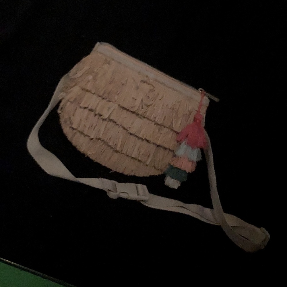 Jungalow by Justine Blekeney Belt Bag with Raffia and pom poms.